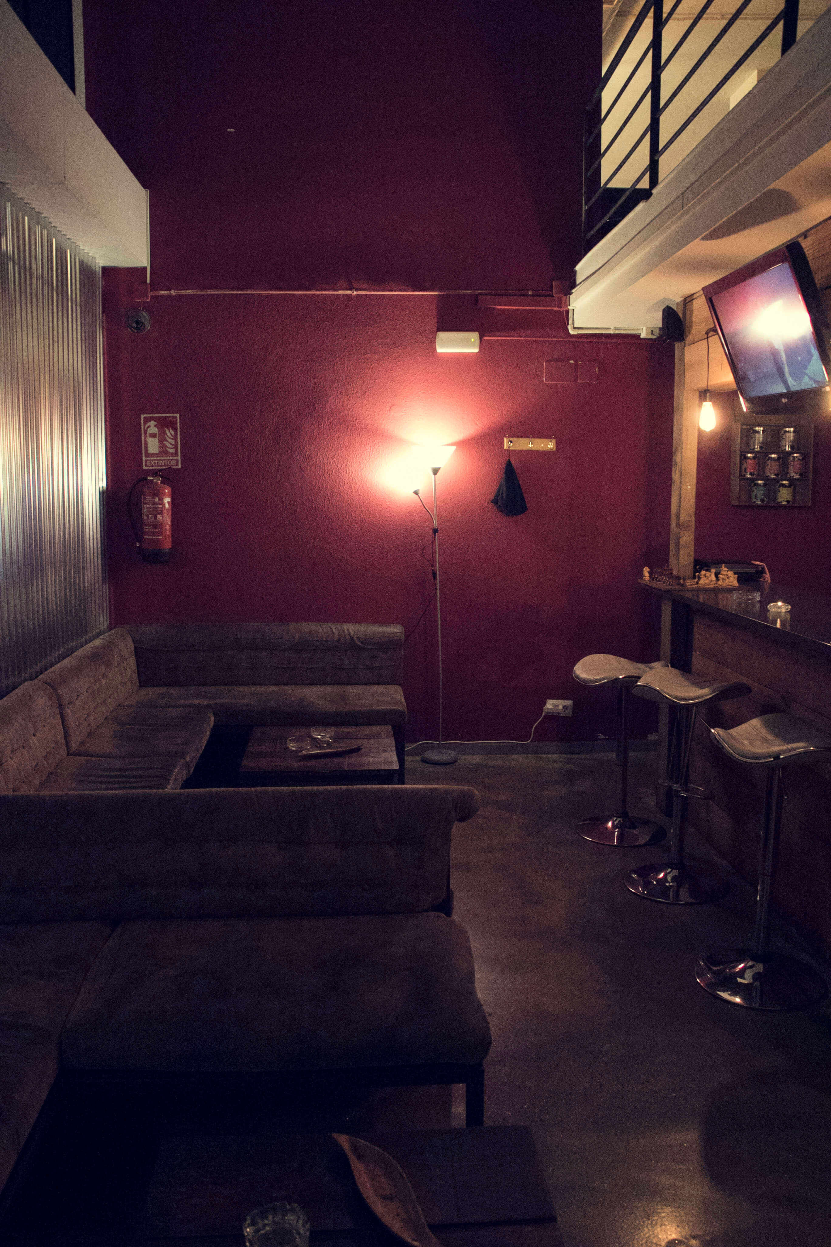 hash cannabis club sofas with table chilling area and bar